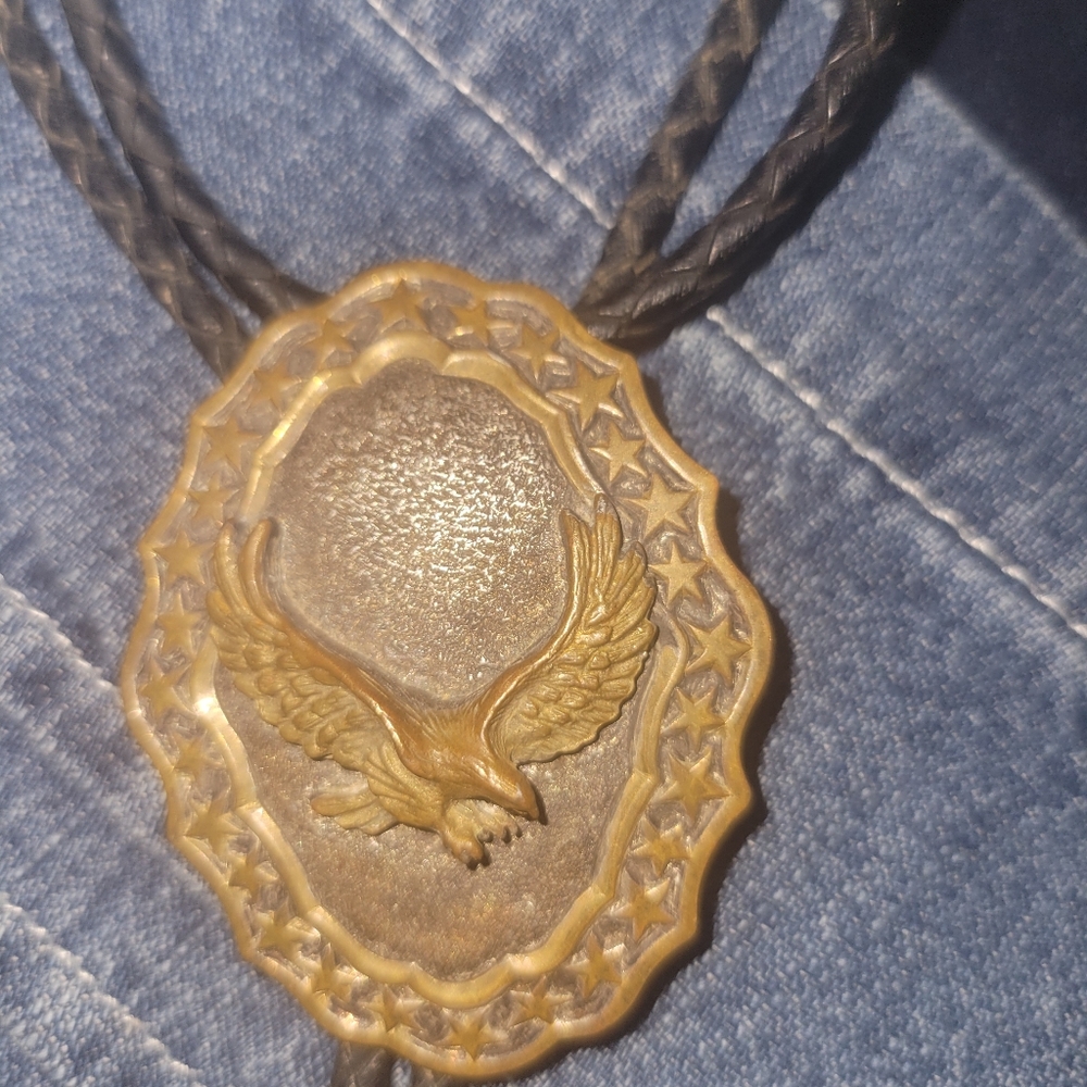 Eagle with stars in brass tone bolo tie
